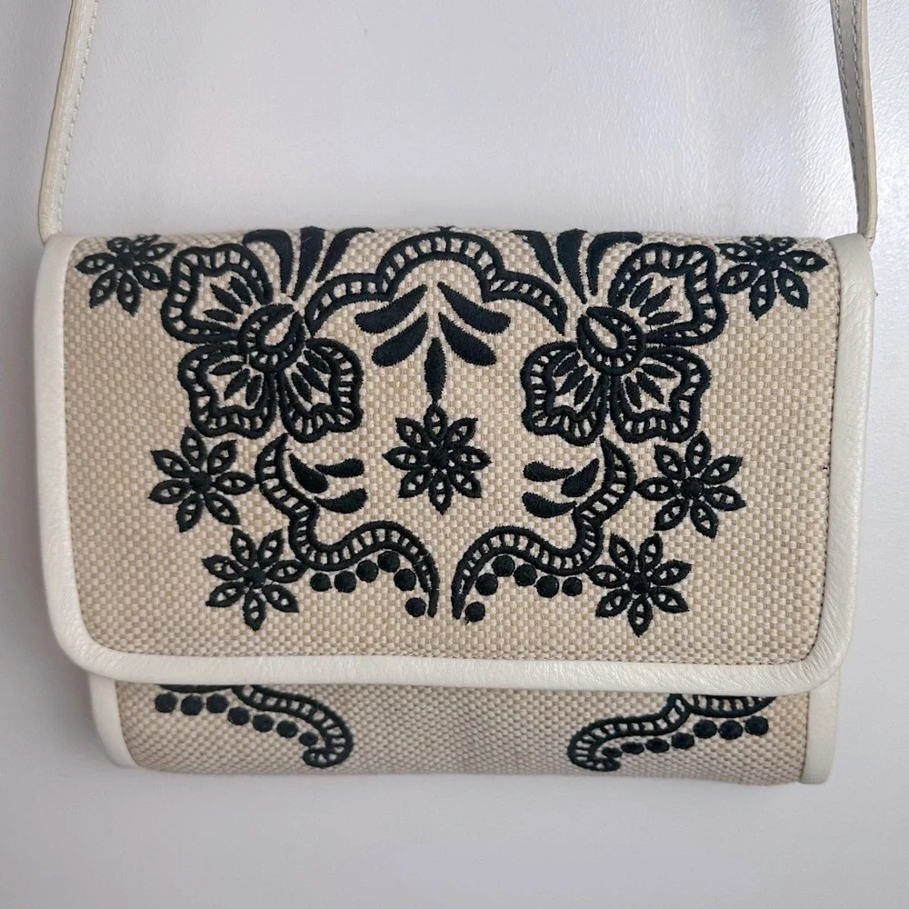 Isabella Fiore Cream Canvas With Black Embroidery Floral Flap‎ Crossbody Purse